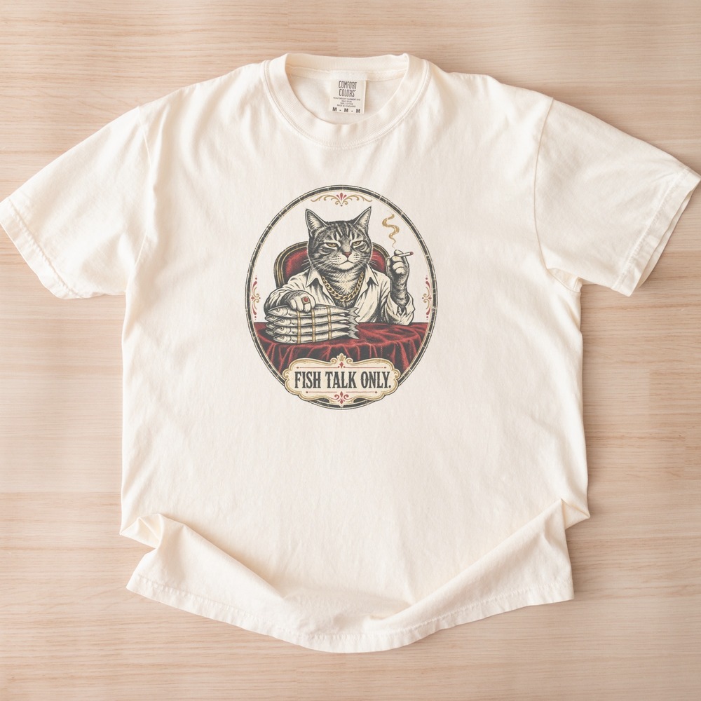 Fish Talk Only Cat Holding His Catch in Oval Badge Tee